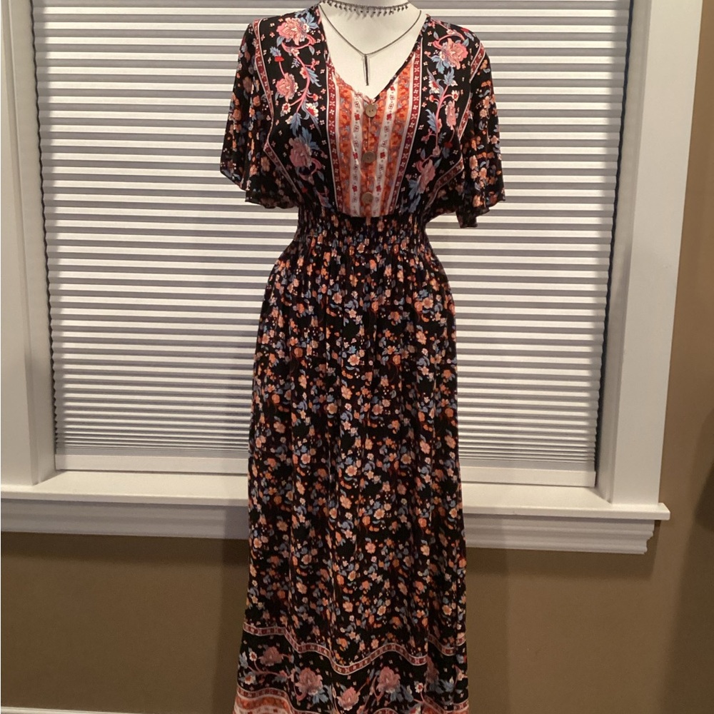 Black Floral Maxi Dress with Pink Accents and Smocked Waist